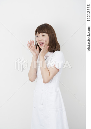 A woman in a white coat 11212888