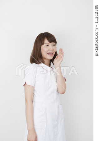 A woman in a white coat 11212889