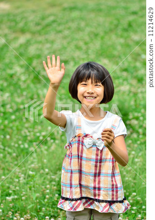 Girls playing on the lawn open space 11214629
