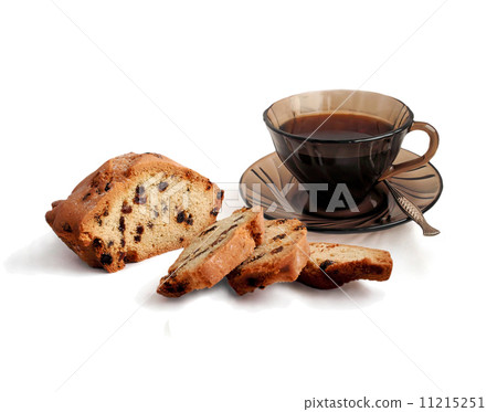 Cup of coffee and cake with raisins. 11215251
