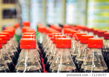 rows of soda bottles rows of soda bottles 11216157
