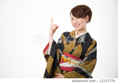 A woman in a kimono A woman in a kimono 11217770