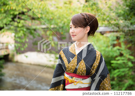 A woman in a kimono A woman in a kimono 11217786