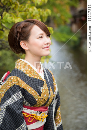 A woman in a kimono A woman in a kimono 11217811