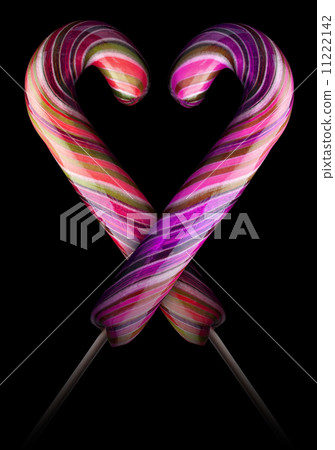 Bright colorful lollipop over black background 11222142