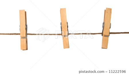 three clothespins on rope 11222596