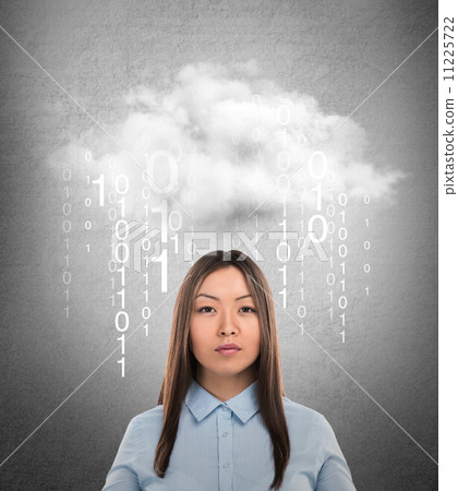 Young business woman or system administrator under cloud with di Young business woman or system administrator under cloud with di 11225722
