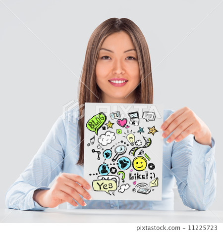 Business woman holding a sign with online services symbols Business woman holding a sign with online services symbols 11225723