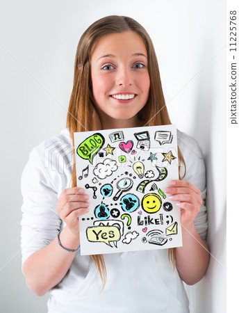 Young girl student holding a sign with online services symbols Young girl student holding a sign with online services symbols 11225768
