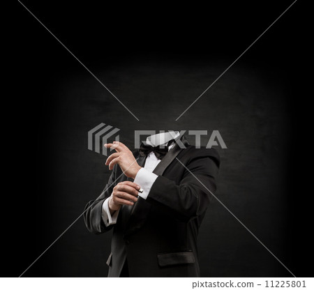 Man without head on dark concrete background Man without head on dark concrete background 11225801