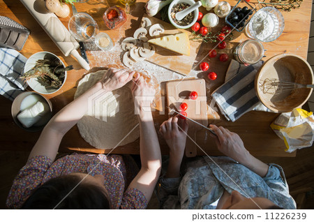Two women cooking Two women cooking 11226239