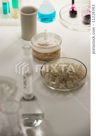 Test tubes, flask and glassware closeup 11226363