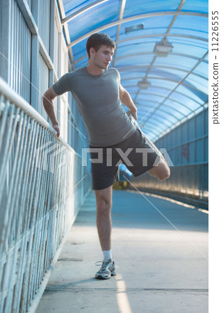 Man stretching Man stretching 11226555