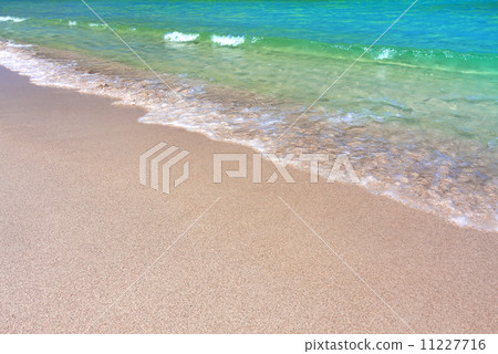 Wave of the sea on the sand beach 11227716