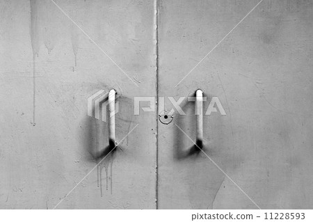 Old metal door with a keyhole Old metal door with a keyhole 11228593