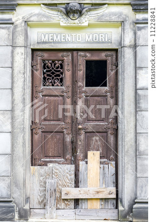 boarded up door to a crypt 11228841