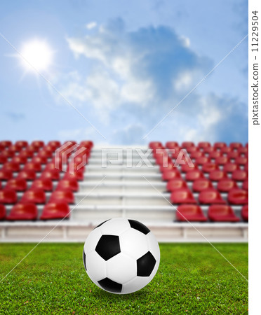 Soccer ball in sport arena with nice sky background Soccer ball in sport arena with nice sky background 11229504
