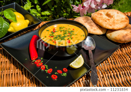 Traditional soup of red lentils 11231834