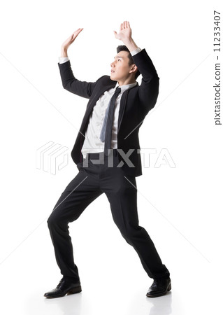 Asian business put hands up 11233407