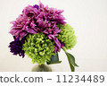 Green and pink artificial flowers 11234489