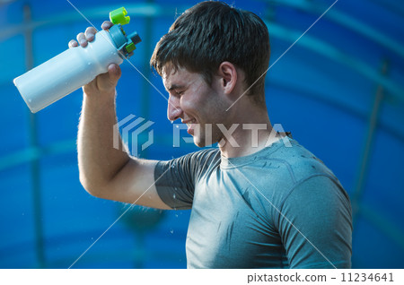 Athlete refreshing water 11234641