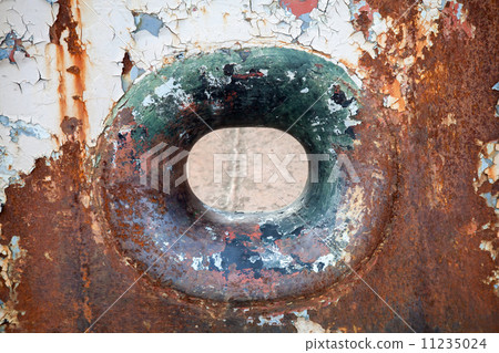 Hawse in old grungy rusted ship hull 11235024