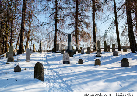 forgotten and unkempt Jewish cemetery with the strangers 11235495