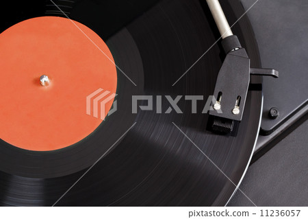 Vintage record player with spinning vinyl. Motion blur image. 11236057