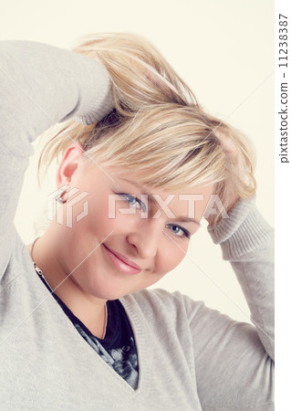 cute smiling relaxing plump woman cute smiling relaxing plump woman 11238387