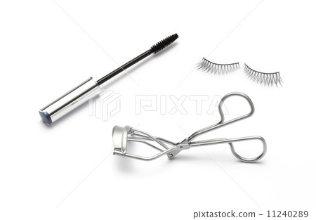 fake false eyelash with eyelash curler and mascara on white fake false eyelash with eyelash curler and mascara on white 11240289