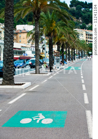 marked bicycle path on a city street 11241104