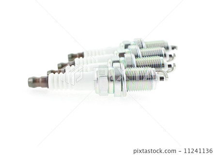 Four Spark Plugs on a white background Four Spark Plugs on a white background 11241136