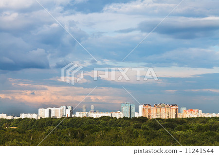 blue clouds in pink sky over city blue clouds in pink sky over city 11241544