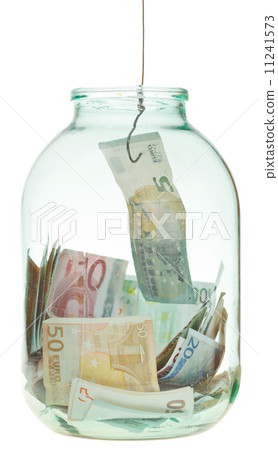 fishing out saving euro money from glass jar 11241573