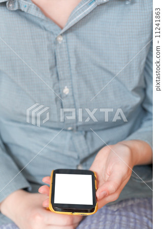 smartphone with cut out screen in hand smartphone with cut out screen in hand 11241863