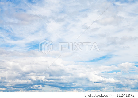 cirrus and cumuli white clouds in overcast sky 11241872
