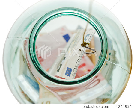top view of fishing saving euro money from jar 11241934