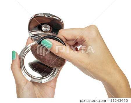 Cosmetic brush and hand 11243630
