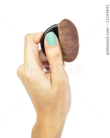 Cosmetic brush and hand 11243641