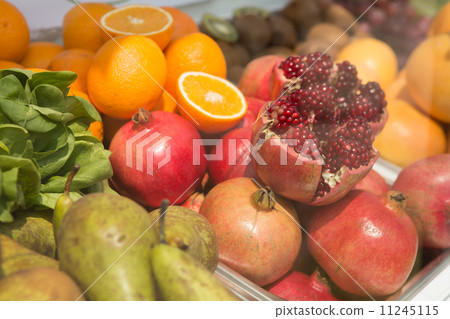 Bright, fresh fruits. Creative background. 11245115