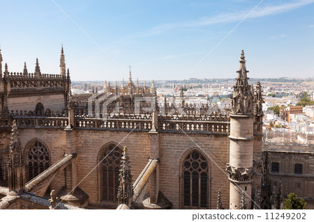 Gothic architecture of a belltower of Hirald and view from it to Seville, Spain Gothic architecture of a belltower of Hirald and view from it to Seville, Spain 11249202