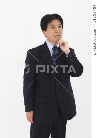 A man in a suit A man in a suit 11255484