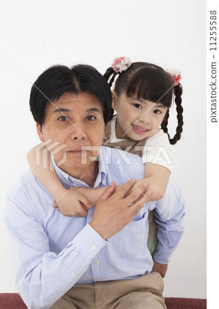 Girl playing with grandfather 11255588