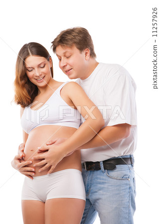 Young couple pregnant mother and happy father Young couple pregnant mother and happy father 11257926