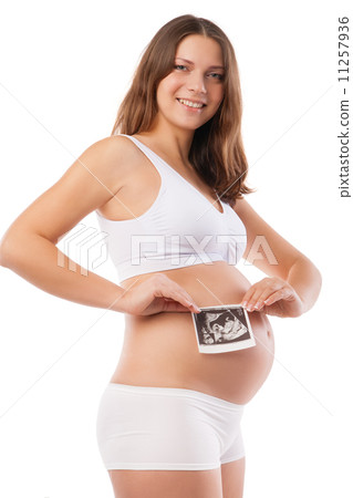 Pregnant woman is holding photo of her Ultrasound Pregnant woman is holding photo of her Ultrasound 11257936