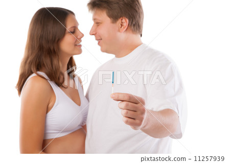 Couple with positive pregnancy shown in test Couple with positive pregnancy shown in test 11257939