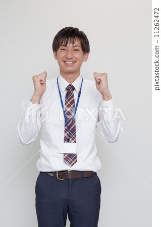 Male employee who plays guts pose 11262472