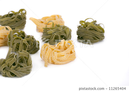 Tasty italian tagliatelle pasta. Tasty italian tagliatelle pasta. 11265404