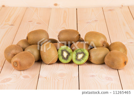 Kiwi fruits cut and whole. 11265465