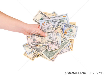 Hand holding heap of dollars. 11265796